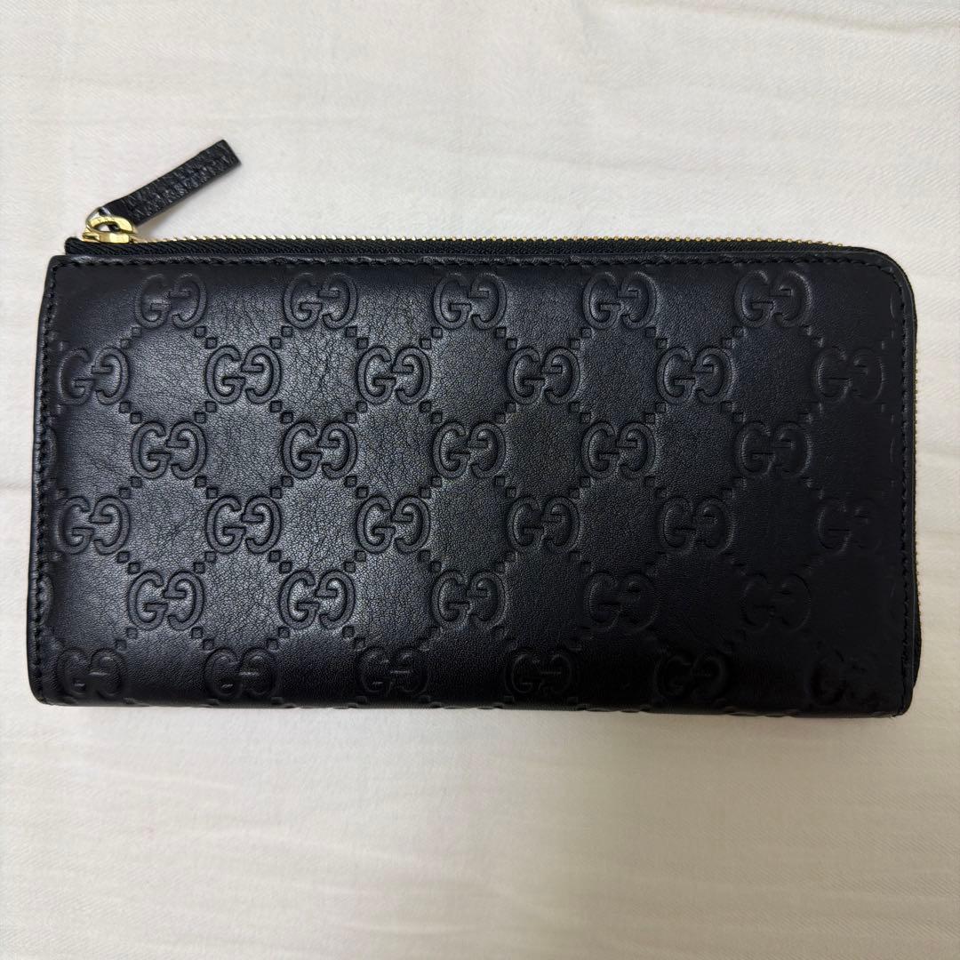 GUCCI ブラック 長財布 エンボスロゴ